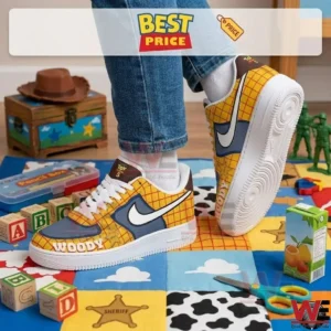A person wearing yellow and blue themed shoes standing on a colorful patterned mat with toys!