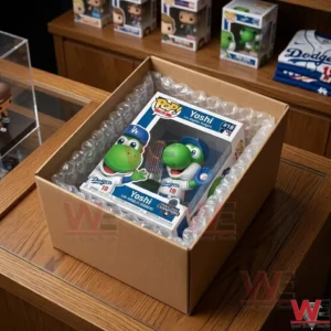 Yoshi x Los Angeles Dodgers World Series Champions 2025 Pop Figure 3 An open shipping box showing a boxed collectible toy secured by bubble wrap on a wooden table!