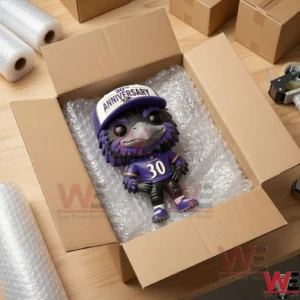 Baltimore Ravens mascot figure in a shipping box