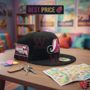 Black Montreal Expos Bright Rose Pink Logo Cap 6 Montreal Expos black cap with side patch on a wooden desk