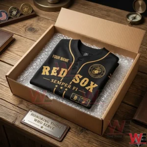 Customized black Red Sox baseball jersey with Marine Corps emblem in a shipping box.