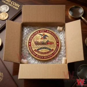 Anheuser-Busch 150th Anniversary collectible commemorative coin in a cardboard box.
