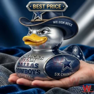 A Dallas Cowboys themed silver rubber duck with a blue cowboy hat being held in a hand.