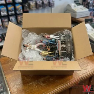 Elvis Presley Graceland diorama collectible figurine inside a shipping box
