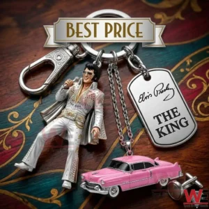 Elvis Presley figure keychain with pink Cadillac and dog tag charms on a wooden table!