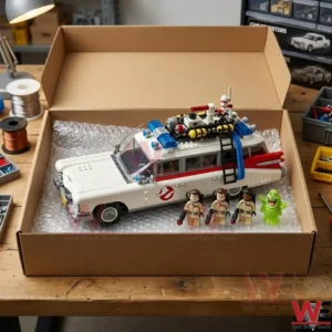 LEGO Ghostbusters Ecto-1 model with minifigures in a shipping box