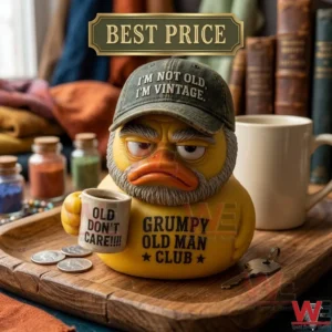 Grumpy elderly rubber duck figurine with a beard and hat holding a coffee mug.