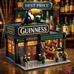 A toy brick model of a Guinness pub with a toucan on top and small figures holding drinks on a wooden surface!