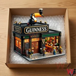 Open cardboard box containing a plastic brick pub model protected by bubble wrap!