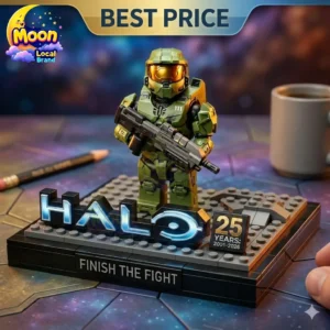 Master Chief action figure standing on a commemorative Halo 25th anniversary display base.