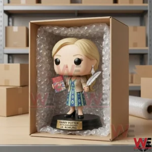 J.K. Rowling collectible figure with book and quill