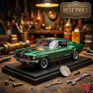 A detailed green diecast 1967 Mustang GT500 model car displayed on a wooden workbench with tools.