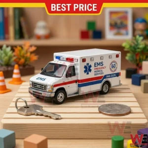 A detailed 1:64 scale diecast Ford ambulance model featuring EMS branding and a 60th anniversary logo.