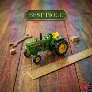 John Deere 4030 model tractor on a rustic wooden table with tools and a ruler.
