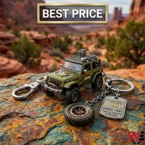 Miniature olive green Jeep Rubicon model and silver keychain on a rock with a desert background!