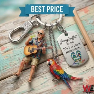 Jimmy Buffett memorial keychain with guitar, parrot, and dog tag charm