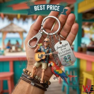 Jimmy Buffett themed keychain with guitar-playing figure and parrot charm