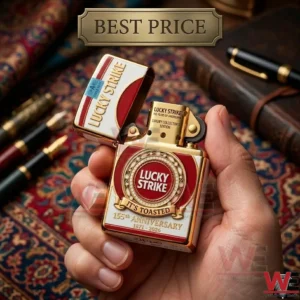 Hand holding a gold-toned Zippo Lucky Strike 155th Anniversary commemorative lighter