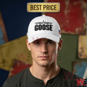 Front view of a man wearing a white baseball cap with black talk to me goose embroidery!