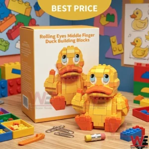 Yellow brick duck toy with expressive eyes sitting on a desk next to its retail box and small office supplies!