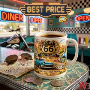 A white commemorative mug on a diner table with coffee inside!