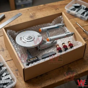 Star Trek NCC-1701 USS Enterprise brick building set inside a cardboard box.