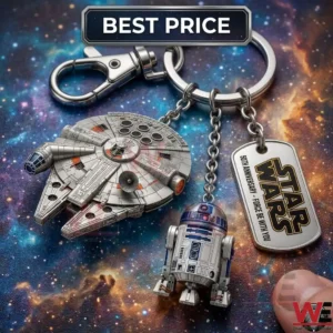A silver keychain set with a miniature spaceship and droid figure on a galaxy background.
