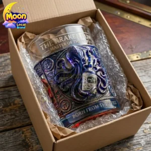 The Kraken Rum branded glass with octopus embossing inside a gift box