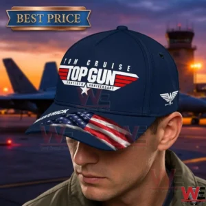 Man wearing a navy blue Top Gun 40th anniversary hat with American flag visor