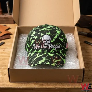 Neon green and black camouflage baseball cap with skull and We the People text embroidery