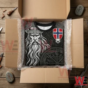 2026 FIFA World Cup Norge Football Viking Vegvisir Warrior Celtic T-Shirt 5 Viking themed t-shirt with Norwegian flag and soccer ball inside cardboard shipping box.