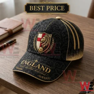 Black and gold England football cap with lion crest emblem.