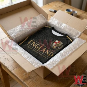 2026 FIFA World Cup UK Football Pride Passion Matchday T-Shirt 5 An England football fan jersey inside a shipping box with bubble wrap.
