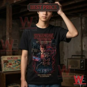 Stranger Things 10th Anniversary Upside Down Hawskin Fan Shirt 5 Person wearing a black Stranger Things 10th anniversary graphic t-shirt.